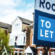 Townhouses with 'Room to Let' sign